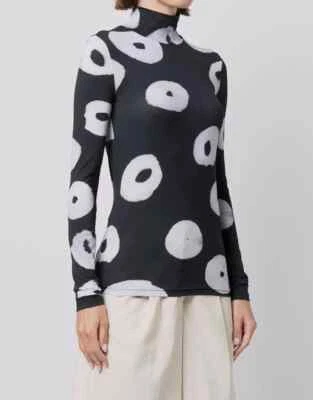 Top tejido segunda piel Nina Ricci cuello alto talla M negro blanco puntos manga larga Foto 1 de 4