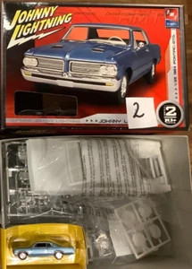 AMT 38462 1:25 Johnny Lightning 1964 Pontiac GTO versiegelt (DF167-29S10) - Bild 1 von 1