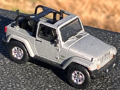 Jeep Wrangler 2011 Greenlight 70 aniversario neumáticos de goma sin techo diecast 1/64 Foto 1 de 4