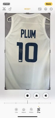 Kelsey Plum  Huskies Autographed Jersey . Beckett - Image 1 of 3