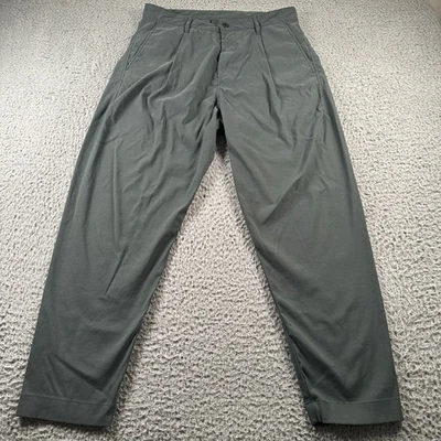 Pantalones Outlier Para Hombre 32 Verde Dos Vías Elastizados Nylon Cónico Plisado Chino Viaje Foto 1 de 4
