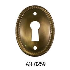 Antiqued Keyhole Stamped Brass Oval Vertical Keyhole Cover with Rope Edging