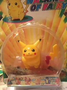 2 POKEMON WIND-UPS MIXED CHARACTERS POKEMON PIKACHU & Pikachu W/. SURFBOARD - Picture 1 of 2