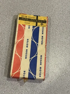 Lente señal de giro delantera izquierda conductor Nissan Stanza 1982-1986 NOS 26126-D0400 Foto 1 de 4