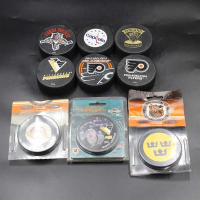 Lote de discos de hockey (9) Finlandia/Suecia/Mario Lemieux/Canucks/Flyers + ZJ18878 Foto 1 de 4