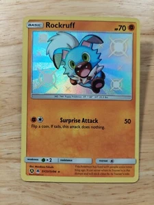 Rockruff SV23/SV94 Destini nascosti lamina olografica rara carta Pokémon - Foto 1 di 2