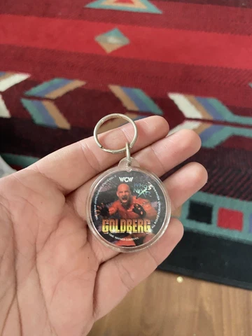 Vintage 1998 WCW Wrestler Goldberg Round Key Chain WWE Cover