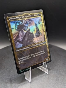 Queza, Augur of Agonies (Gilded Foil) Streets of New Capenna Foil - Picture 1 of 4