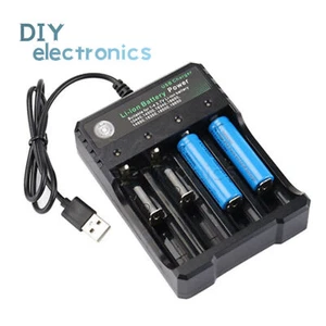 Caricabatterie 1/4 slot ricarica intelligente per batteria ricaricabile agli ioni di litio 18650 USB US - Foto 1 di 11