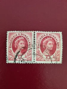 World Stamps. 2 x joined RHODESIA AND NYASALAND Pre-Decimal Stamps - Picture 1 of 1