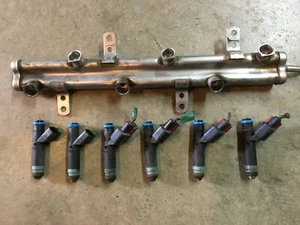 01-07 2006 DODGE CARAVAN TOWN & COUNTRY FUEL RAIL WITH INJECTORS 3.8L - Picture 1 of 4