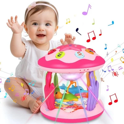 Juguete musical giratorio Ocean Light Up para bebés 6-36 meses rosa gateo regalo Foto 1 de 4