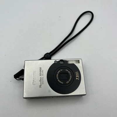 Canon PowerShot ELPH SD1000 7.1MP Digital Camera Parts Repair No Batt As Is - Image 1 of 4