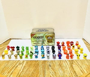 Gogo’s Crazy Bones Gold  Series 1 Tin With 50 Figures Some Rare Read JDNA 2010 - Picture 1 of 13
