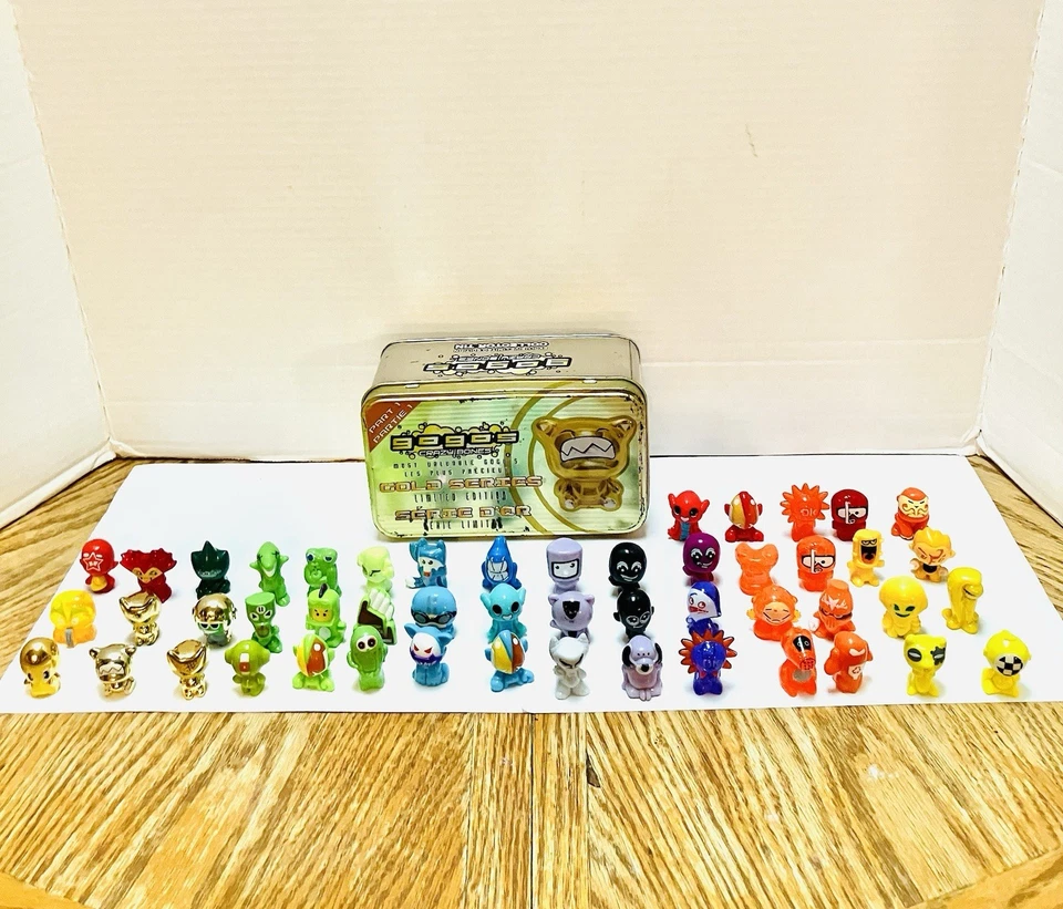 Gogo’s Crazy Bones Gold  Series 1 Tin With 50 Figures Some Rare Read JDNA 2010 - Image 1 of 4