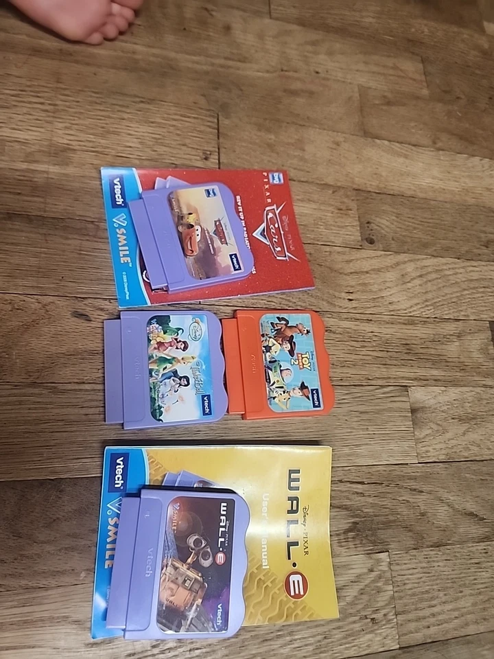 Vtech VSmile Lot Of 4 Video Games Disney, Cars, Tinkerbell, Toy Story 2, Wall E - Image 1 of 4
