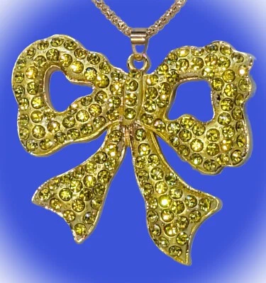 Precioso collar con lazo de vacaciones Betsey Johnson peridoto verde amarillo cristal brillante Foto 1 de 4