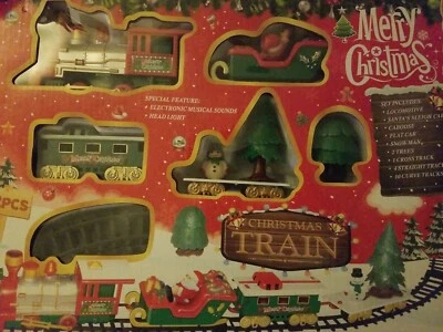 CHRISTMAS TRAIN TOY SET WITH ELECTRONIC MUSICAL SOUNS AND HEAD LIGHT - Image 1 of 4