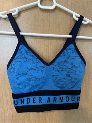 Sujetador deportivo de compresión Under Armour azul negro almohadillas extraíbles para mujer X pequeño Foto 1 de 4
