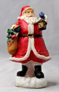 Estatuilla de pie de Santa Claus con bolsa de juguete con linterna de 5" de alto - Imagen 1 de 10