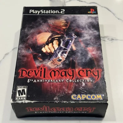 Devil May Cry: 5th Anniversary Collection большая коробка (PS2 2006) полное руководство в коробке - Изображение 1 из 4