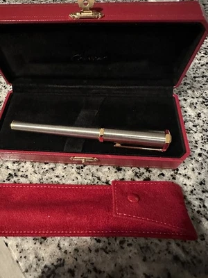 Bolígrafo Cartier Luxury Santos de Cartier cuerpo dorado con caja Foto 1 de 3