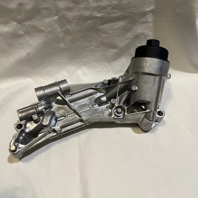 Enfriador de aceite de motor con conjunto de filtro de aceite para Chevrolet Cruze Aveo 12992593 Foto 1 de 4