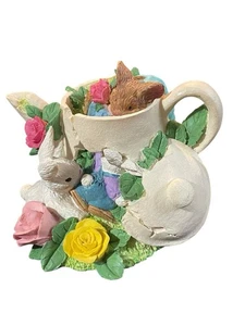 EASTER SPRING BUNNY RABBIT PLAYING ON Faux Damaged TEAPOT RESIN FIGURINE - Picture 1 of 10