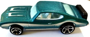 Cyan and White 2003 Mattel Olds 442 Oldsmobile - Picture 1 of 3