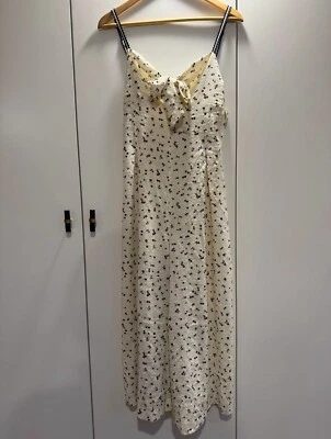 Nuevo sin etiquetas Mono Free People Intimately Negro Crema Marfil Ditsy Floral XS Foto 1 de 4