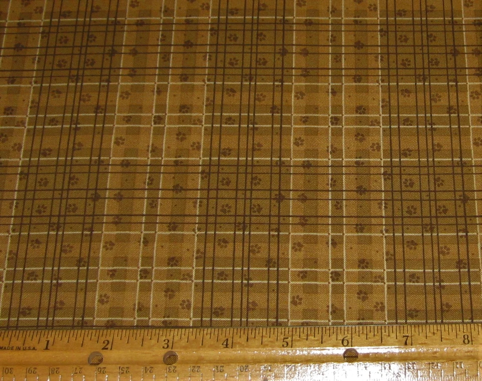 1 yarda de cuadros marrones con patas de perro en tela 100% algodón Foto 1 de 1