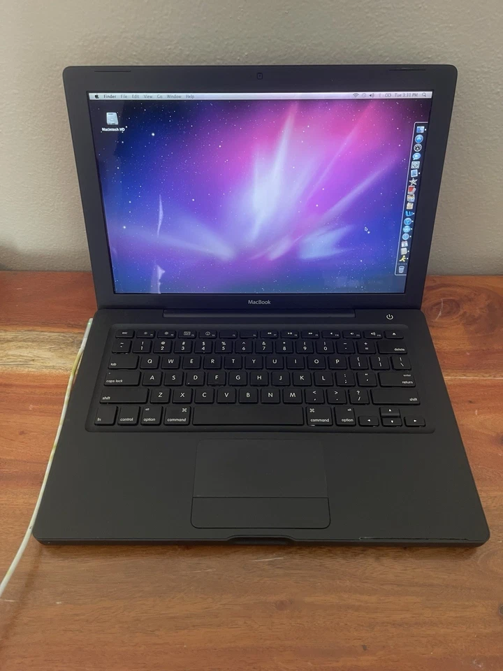 Black Apple MacBook A1181 Laptop 2007 Core 2 Duo Needs New Battery, No Internet - Image 1 of 4