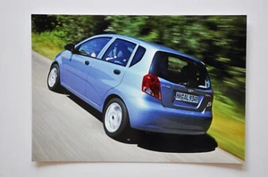 Car Press Photo - 2003 Daewoo Kalos - Blue - Back / Side View - Picture 1 of 1