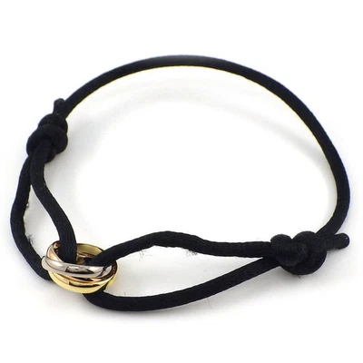 Браслет Cartier Trinity B6016700 онлайн эксклюзивный 750 трехцветный золотой черный шнур - Изображение 1 из 4