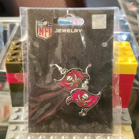 Tampa Bay Buccaneers dangley earrings! Brand new in the package! Cover