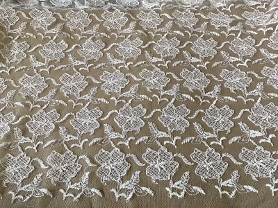 10 YDS AllOVER OFF WHITE RAYON FLORAL EMBRD ON NYLON NET - Image 1 of 4
