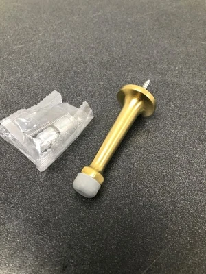 Baldwin 4045044 3 Inch Baseboard Mounted Rigid Door Stop - Satin Brass - Image 1 of 2