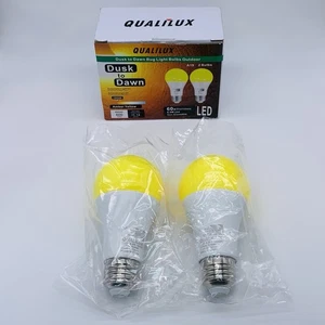 2 PK Qualilux Dusk to Dawn Bug Light Bulbs Outdoor 1900K Amber Yellow 600 Lumens - Picture 1 of 11