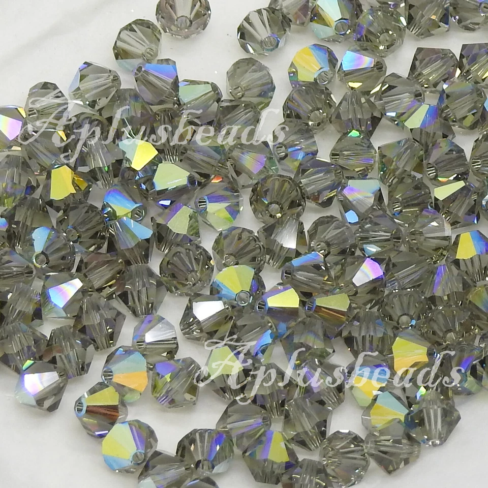 Auténtico cristal de Swarovski #5301, #5328 cuentas bicónicas de 3 mm 60 piezas revestimiento AB Foto 1 de 1