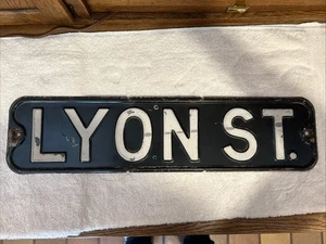 Vtg Antique LYONS ST. Street Sign 24”x6” Black & White Porcelain Steel Embossed - Picture 1 of 7