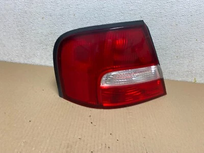 Luz trasera lateral izquierda Nissan Altima 2000 a 2001 OEM M7857 DW Foto 1 de 4