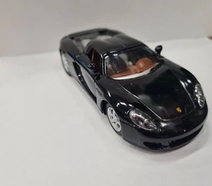 Porsche Carrera Gt Negro Kinsmart Coche Juguete Modelo 1/36 Escala Open Puertas - Imagen 1 de 2