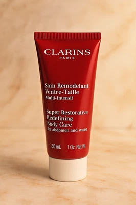 Crema reafirmante Clarins Super Restaurative Redefining Body Care 1 oz tamaño de viaje Foto 1 de 4