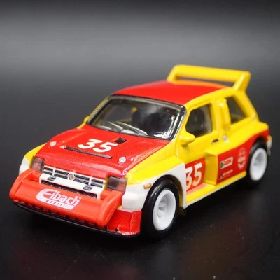 1984-1987 MG Metro 6R4 Castrol Auto da Corsa 1:64 Diorama Scala Modellino Auto - Immagine 1 di 4