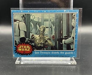 1977 TOPPS STAR WARS BLU SEE-THREEPIO DEVIA LE GUARDIE #34 C-3PO Luke Solo - Foto 1 di 2