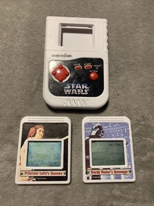 Star Wars Game Wizard palmare elettronico con 2 giochi Vader/Leia funziona - Foto 1 di 6