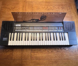 Lowrey V-101 Micro Genie Teclado Sintetizador Vintage PARA REPUESTOS o REPARACIÓN - Imagen 1 de 8