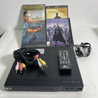 LG DP132H Reproductor de DVD CD con 4 películas, control remoto probado y funcionando Foto 1 de 4