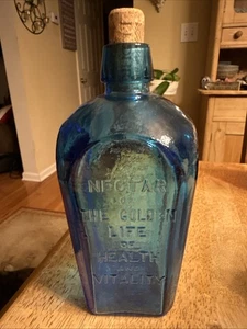 Botella de colección Wheaton boticario Straubmullers elixir árbol de la vida vidrio azul excelente - Imagen 1 de 7