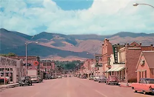 Vintage Postcard; Main Street Scene, City of Salmon ID Lemhi Co. Business Signs - Picture 1 of 2